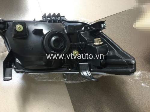 Đèn pha Rh Ford Laser 2003