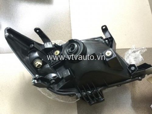 Đèn pha Rh Ford Laser 2003