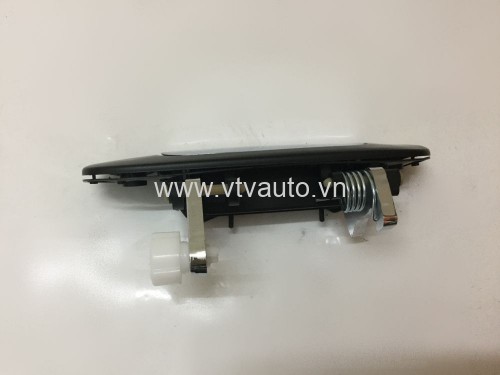 Tay mở ngoài sau trái Ford Laser