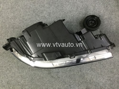Đèn pha bên trái Mazda 323 2001-2004