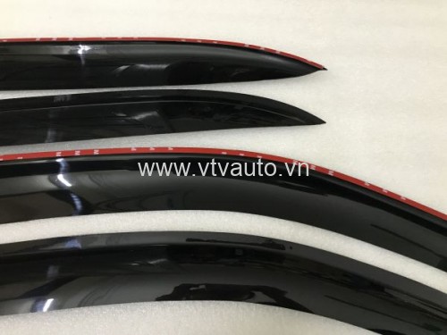Vè che mưa Ford Laser, Mazda 323