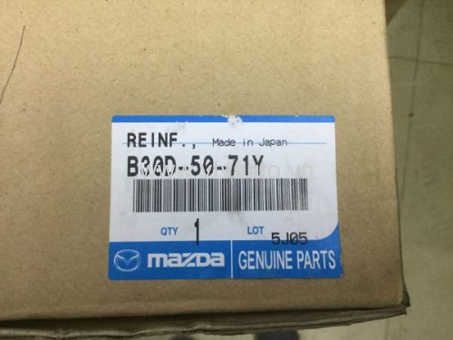 Mặt ca lăng Mazda 323, 2000-2004